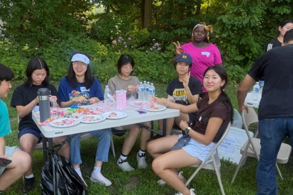 PAC Meeting helpers participating in an art activity