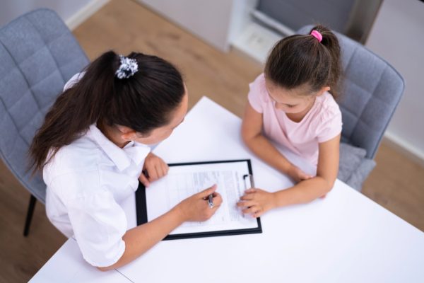Nurse talking to girl