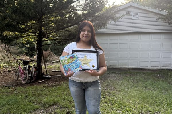 Dulce 2 Dulce with her coloring book