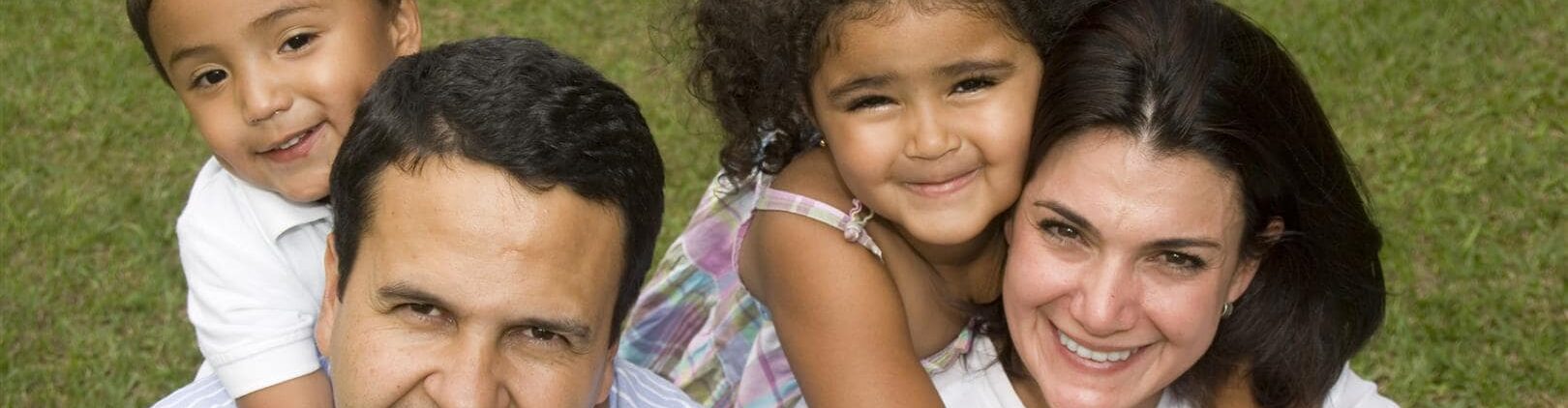 Family Resources - Picture of a smiling family.